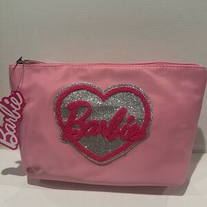NWT Barbie Pink waterproof Cosmetics Pouch with zipper closure.